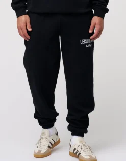 Baggy Leisure Club Cuffed Track Pants in Washed Black
