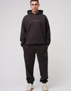 Baggy Leisure Club Cuffed Track Pants in Washed Black
