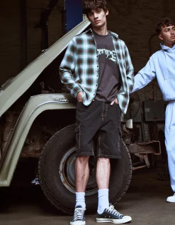 Relaxed Fit Cargo Jorts in Washed Black