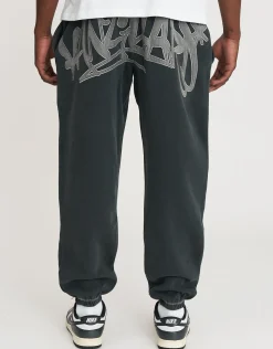 Vanguard Graffiti Baggy Track Pants in Washed Black