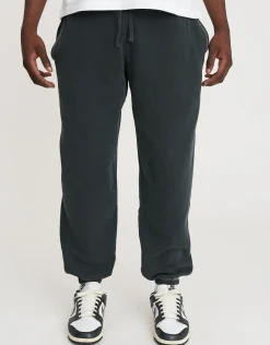 Vanguard Graffiti Baggy Track Pants in Washed Black